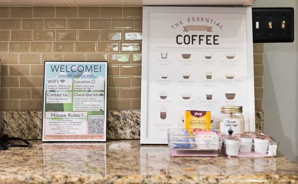 Thoughtful signage offers a warm welcome and a handy coffee guide, letting you craft your ideal cup.