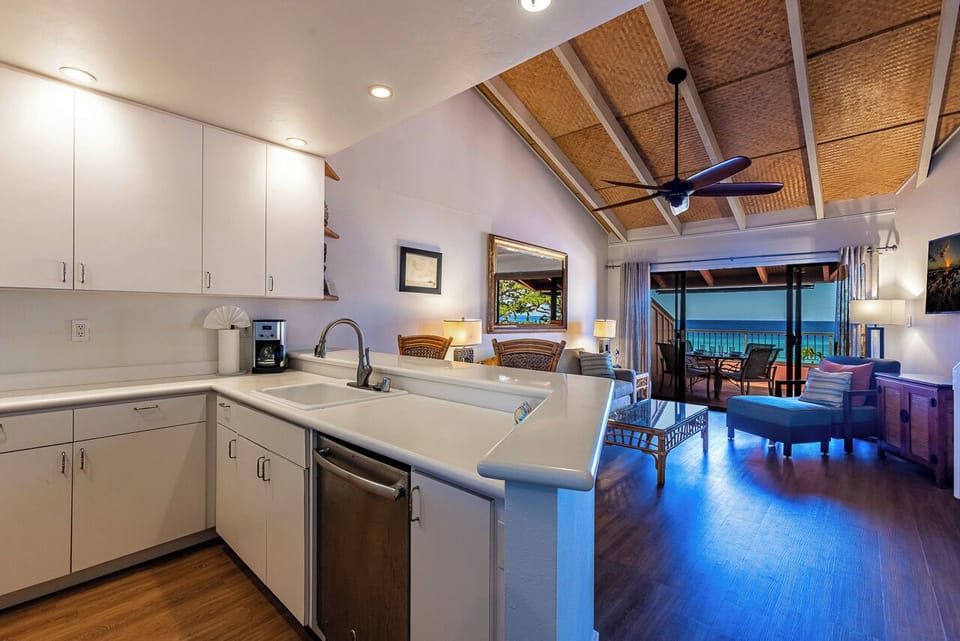 The kitchen flows seamlessly into the living space, perfect for preparing meals.