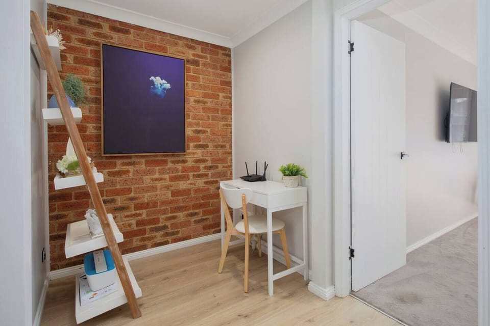 Dedicated workspace, perfect for remote work or catching up on emails during your stay.