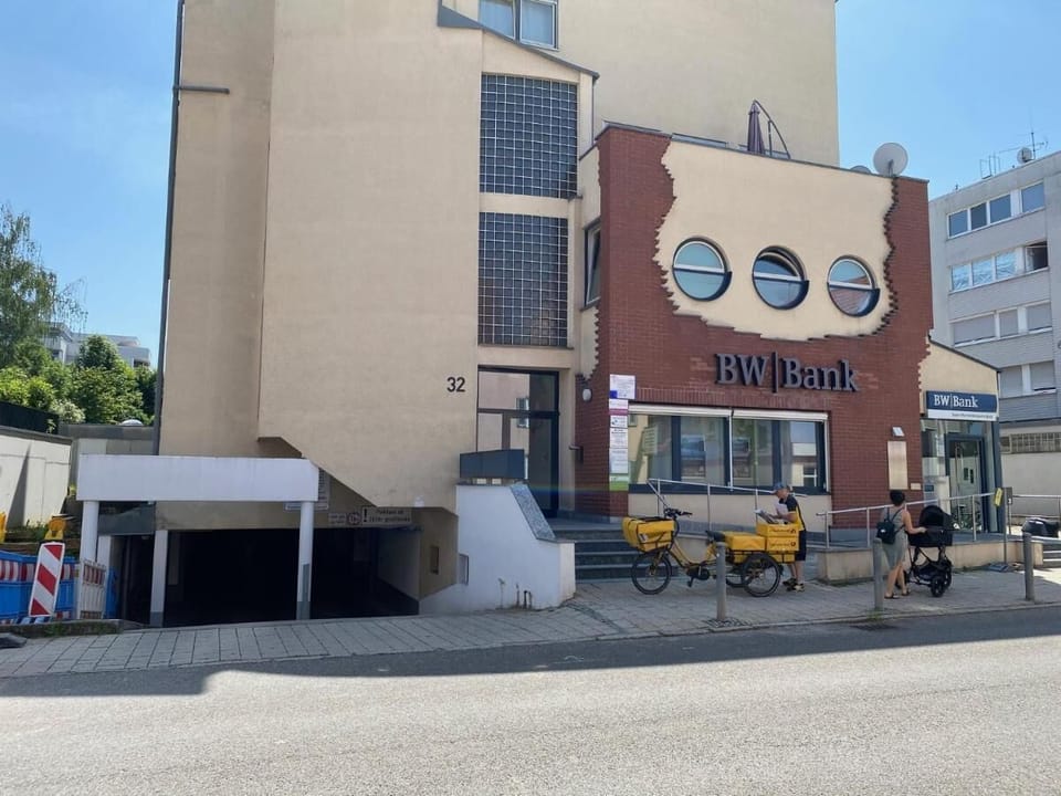 The exterior view of the house and access to the garage