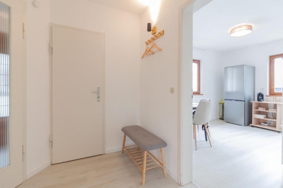 The entrance area to the kitchen and toilet