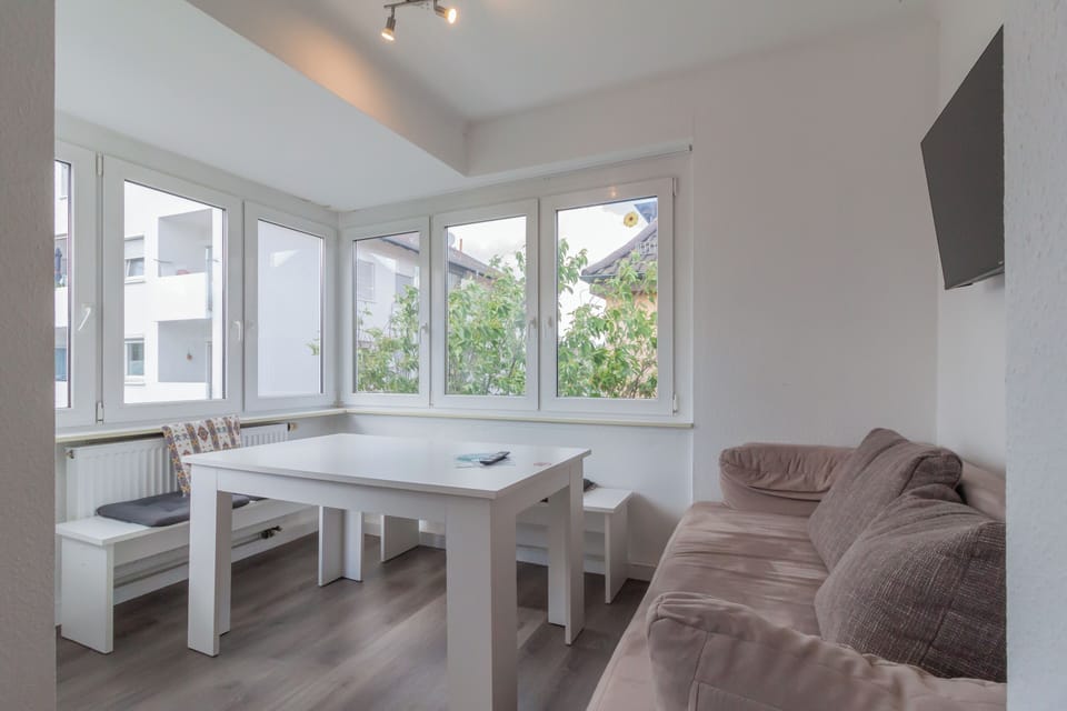 The bright dining area with Smart TV