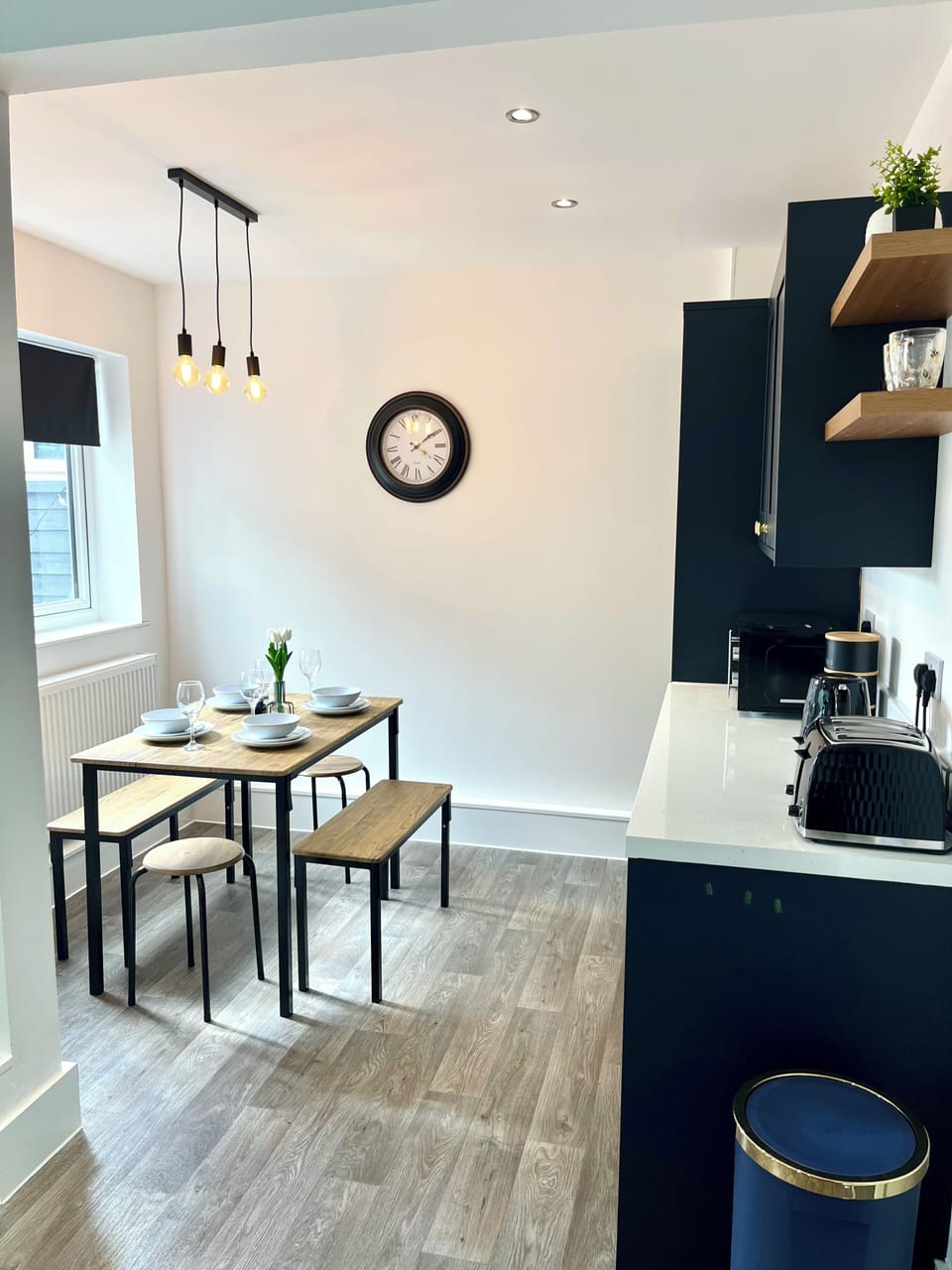 Bright, spacious dining area with table that can seat up to 6 people.