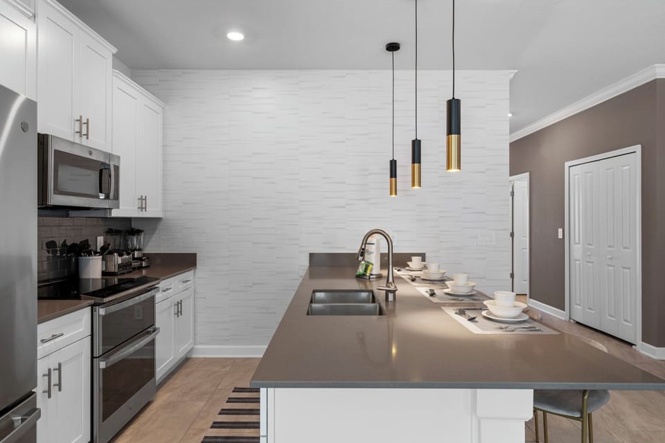 Open-concept kitchen blending style and functionality for cooking and memories.