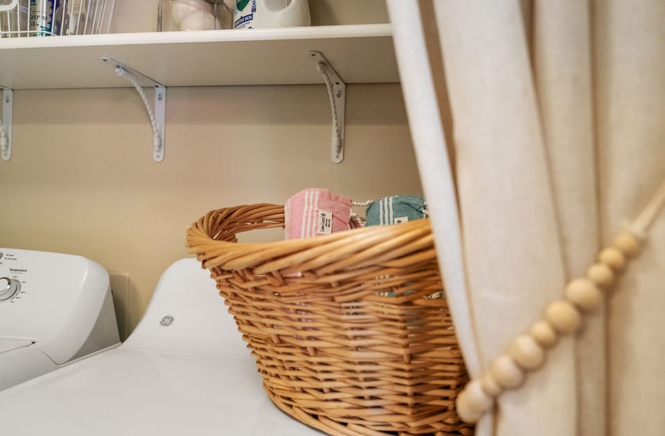 Starter laundry essentials and dryer balls provided. 