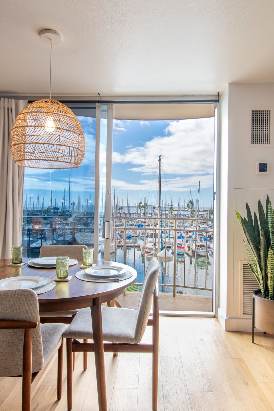 Dining area with a view of the marina and high quality black out curtains