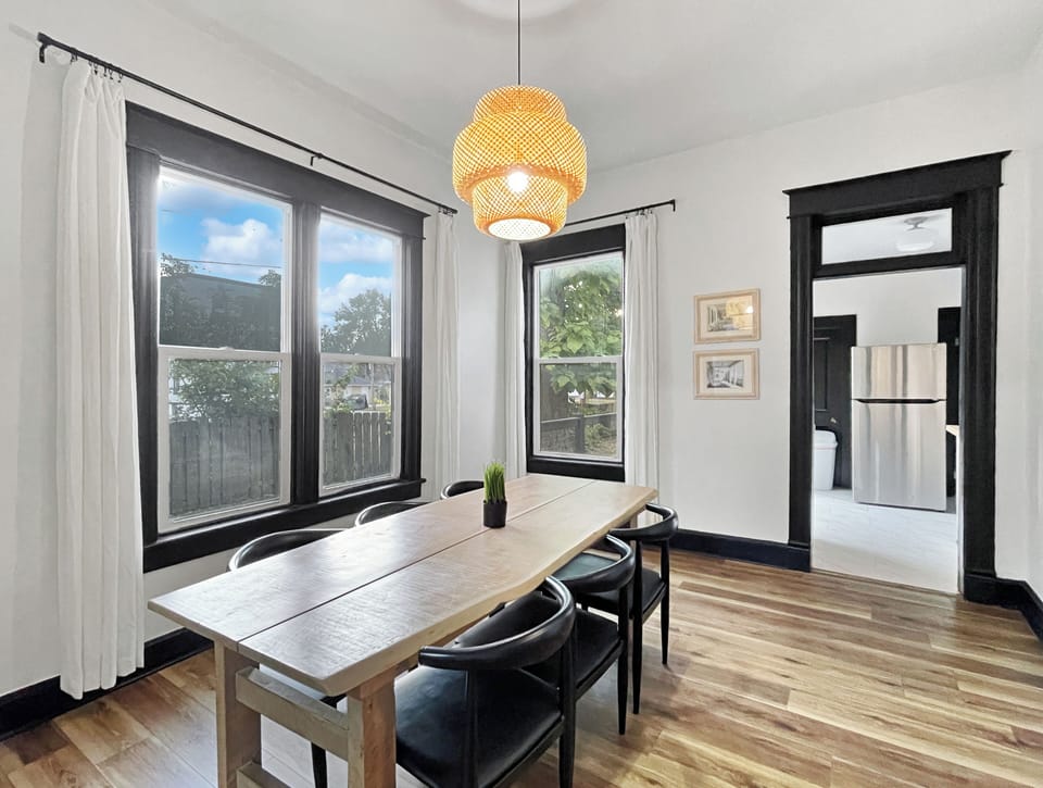 Gorgeous dining room table leading into the kitchen