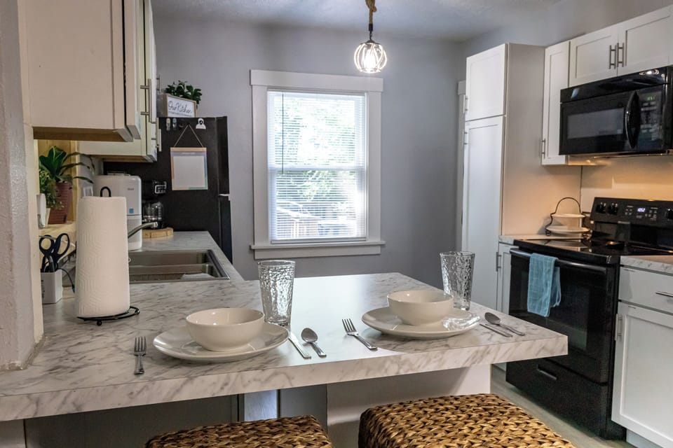 Enjoy meals together at the breakfast bar with seating for two