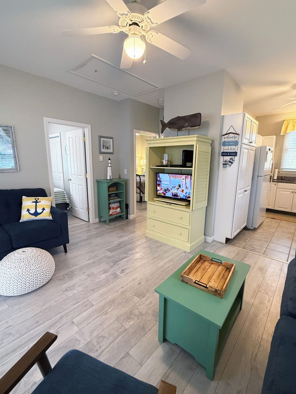 Open living room also features furniture from Maine Cottage for extra storage