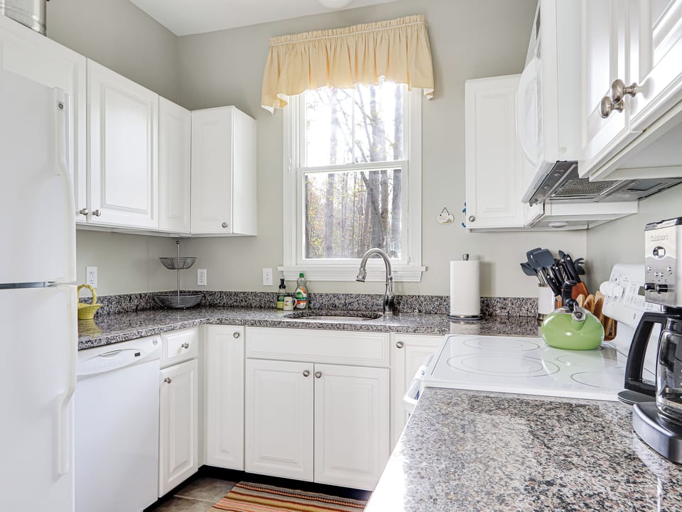 Sunny kitchen with granite countertops