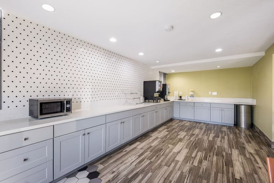 Grab coffee and quick bites anytime in the communal breakfast area