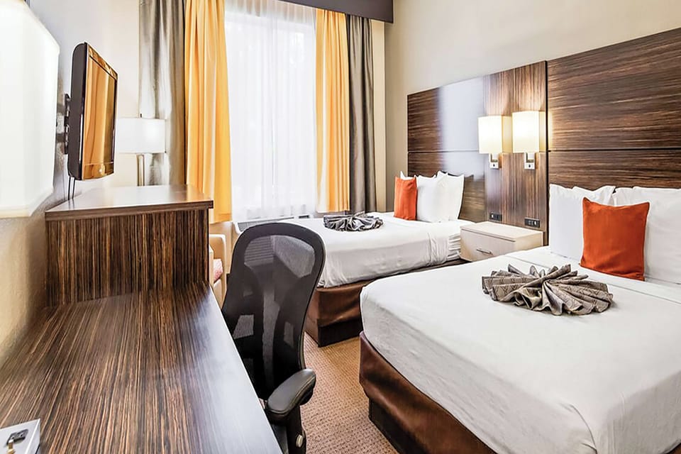 Wake up refreshed with natural light and comfortable bedding.