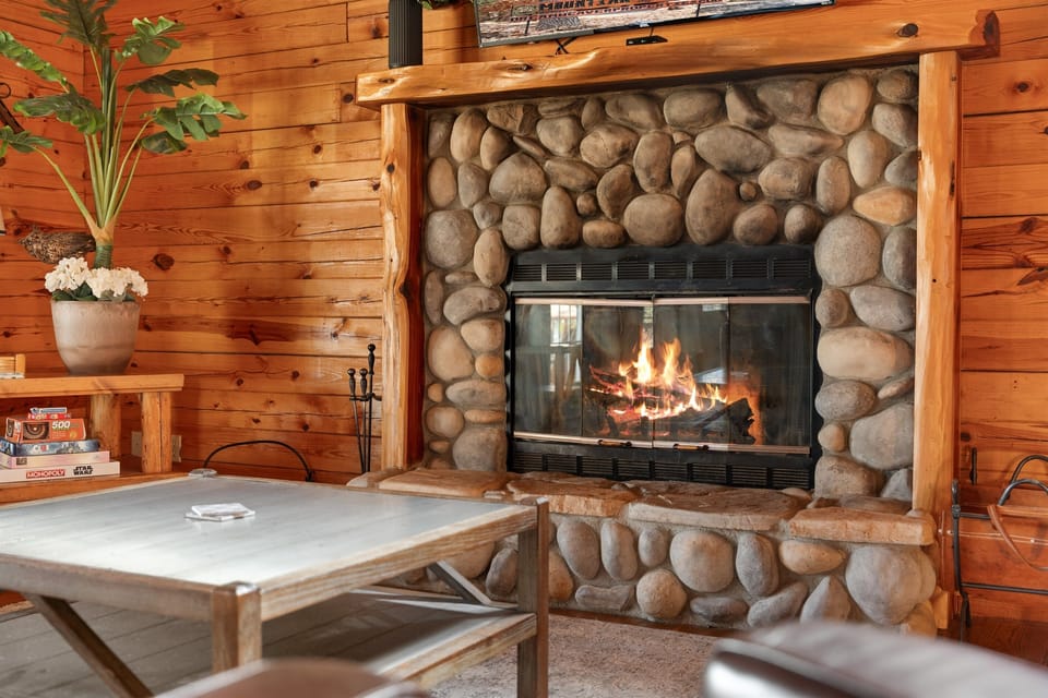 Get toasty, get close — fireside cuddles in your woodland cabin