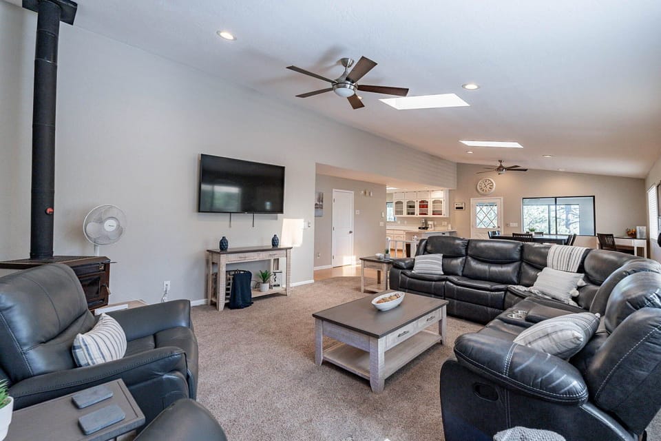 So much space! Main living room with lots of seating and TV.
