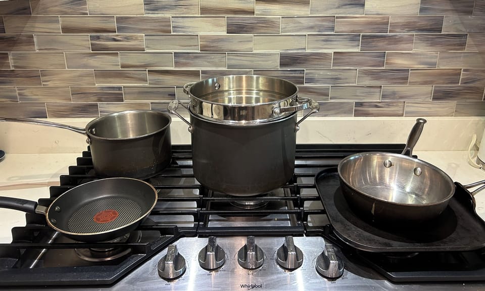 Chef's kitchen with stainless cookware