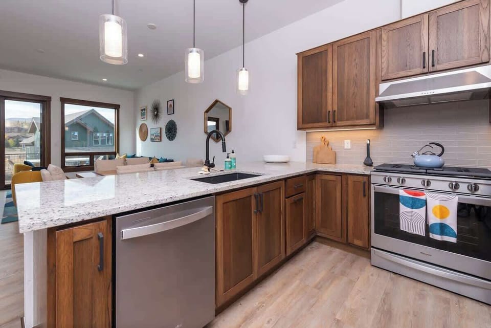 Welcome to Zephyr Escape! Your cozy getaway awaits with a stylish living room, fully equipped kitchen, private hot tub, and a perfect spot for movie nights.