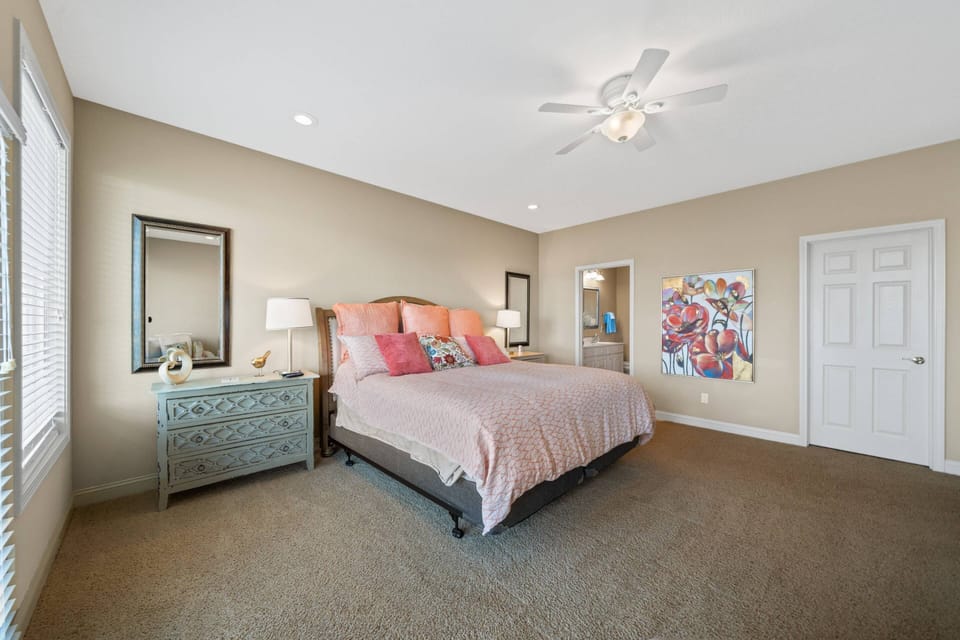 Bedroom 1 | King Bed W/ Bathroom 1 Attached | Lake Views & Patio Access