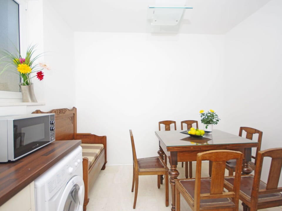 Furniture, Cabinetry, Property, Table, White, Plant, Building, Chair, Interior Design, Orange