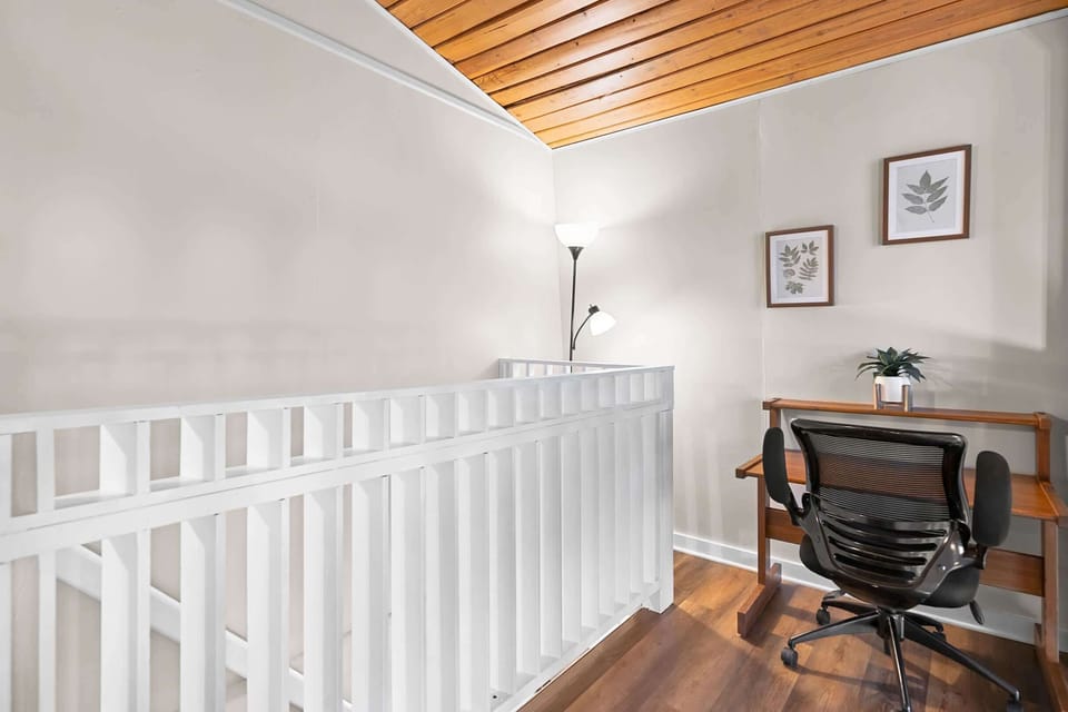 Upstairs landing with sitting area and workspace