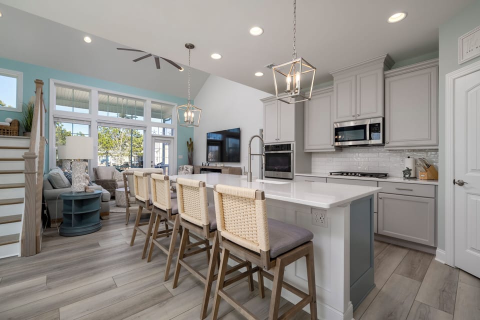 Large kitchen Island with 4 stools.