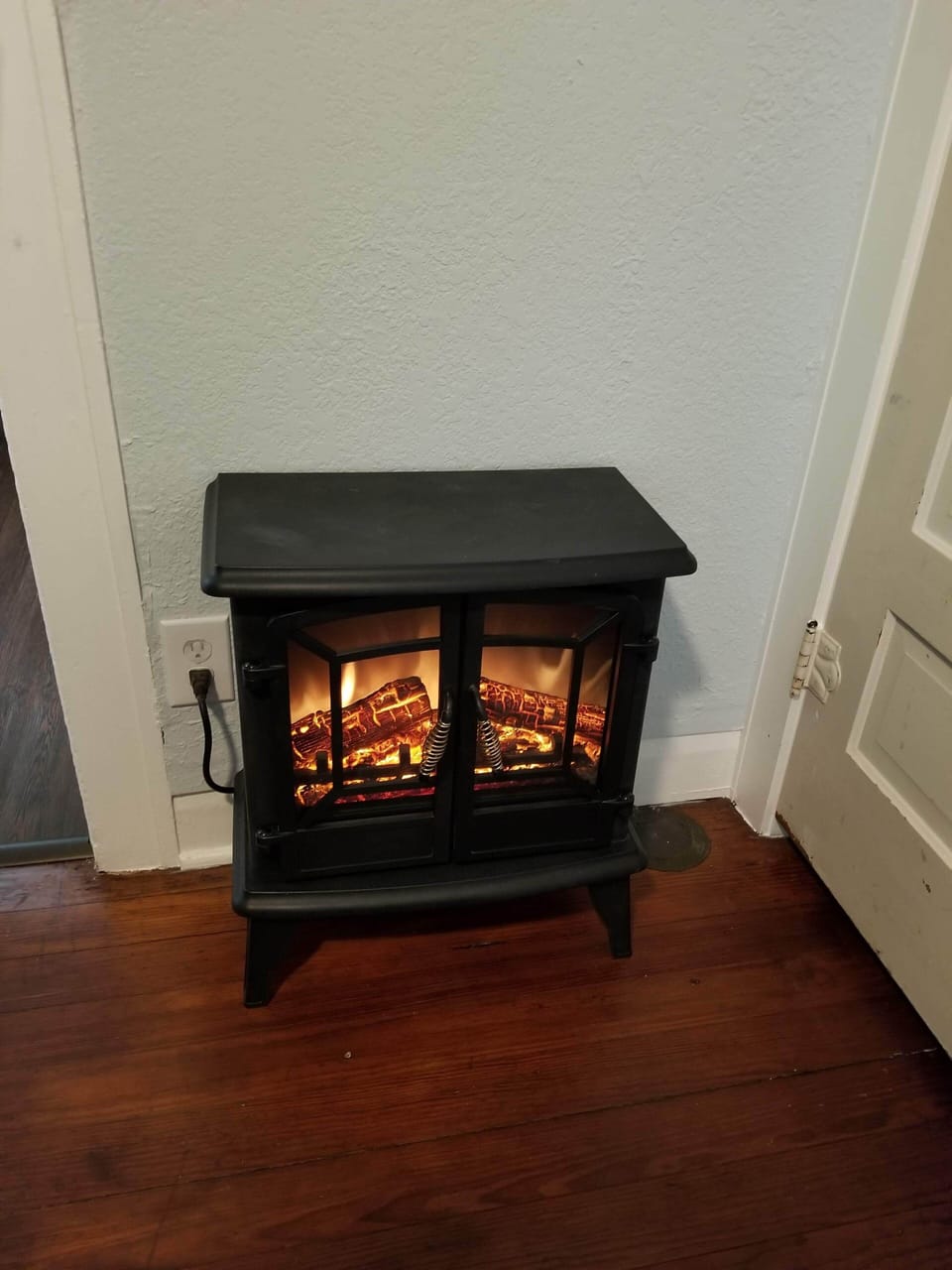Electric fireplace in bedroom 1