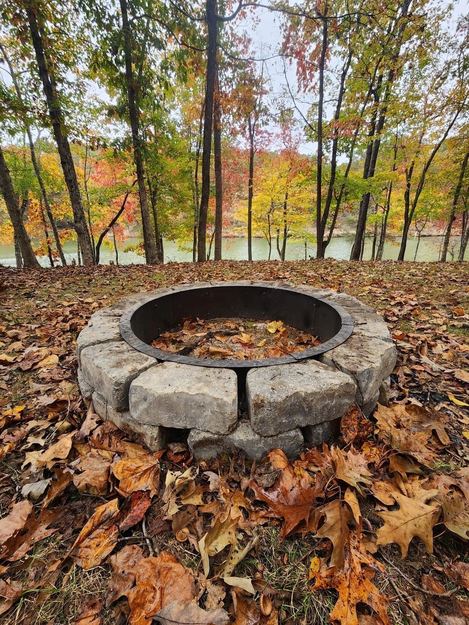 Fire pit with lawn chairs, firewood onsite