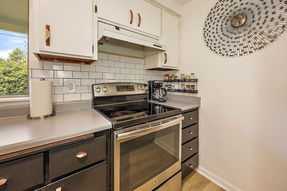 full kitchen with electric stove