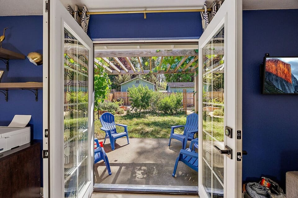 view from living room to patio and garden
