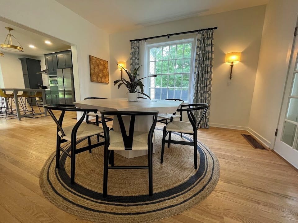 Enjoy meals together at the dedicated dining table that comfortably seats 6, perfect for family dinners and gatherings in our Saugatuck