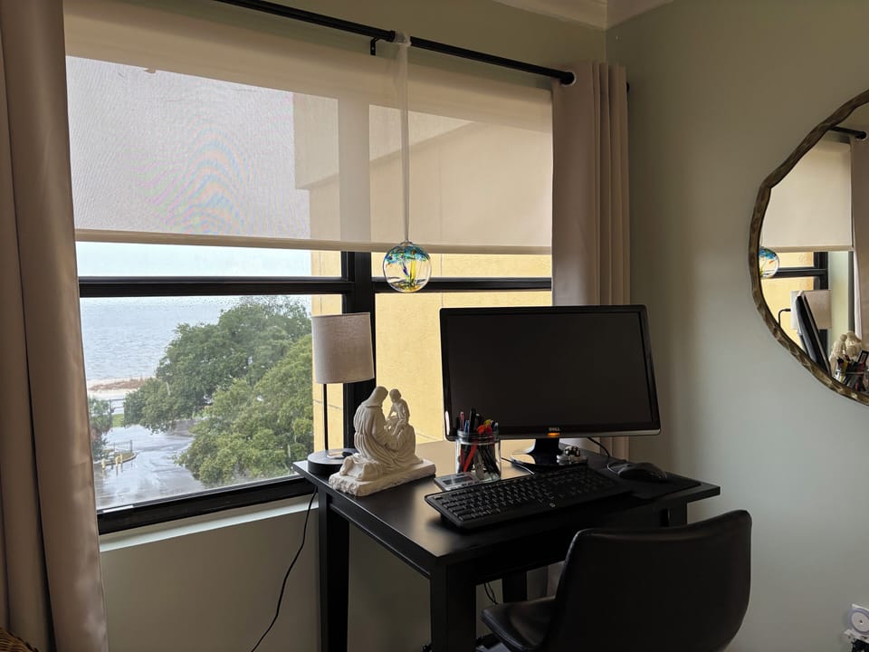 Master Bedroom with work area just bring your pad. Another great view! 