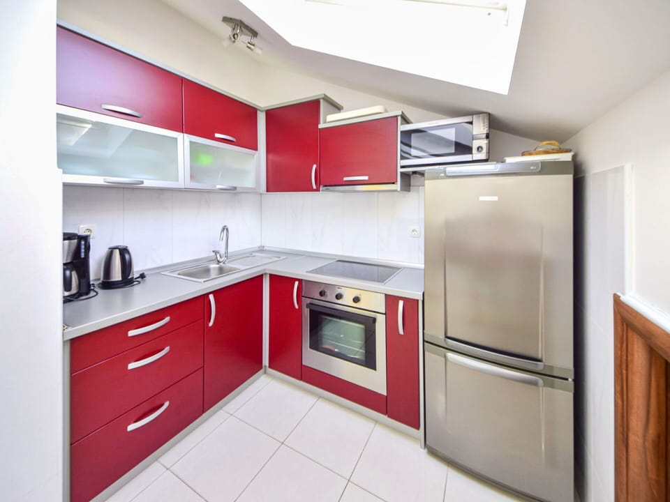 Cabinetry, Countertop, Furniture, Kitchen, Tap, Kitchen Stove, Home Appliance, Drawer, Kitchen Appliance, Wood