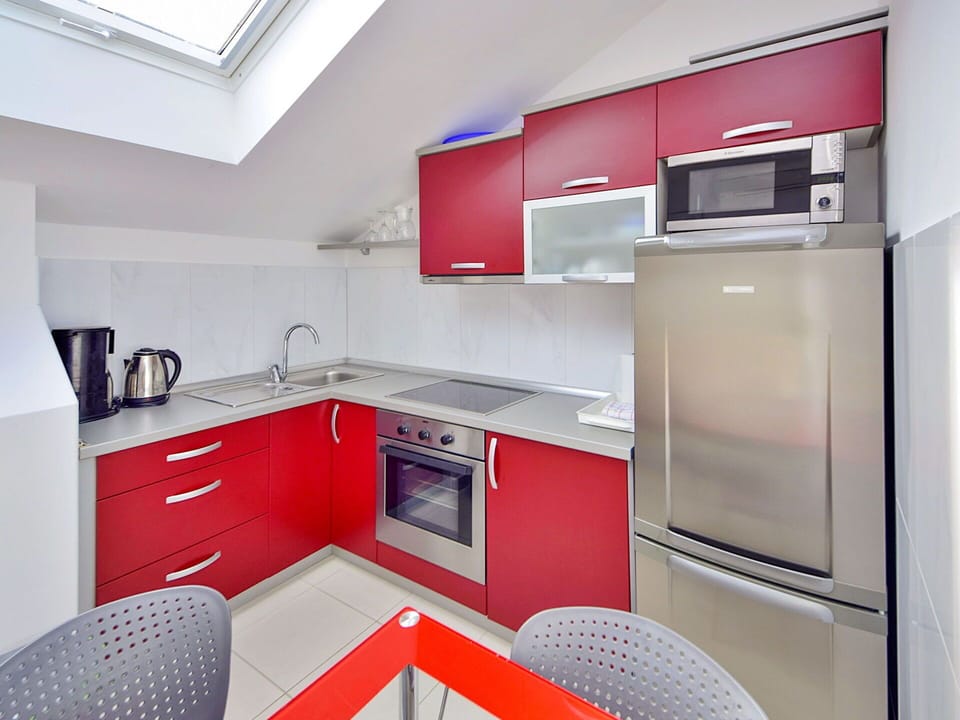 Cabinetry, Property, Countertop, Sink, Tap, Interior Design, Kitchen Stove, Lighting, Kitchen Sink, Architecture