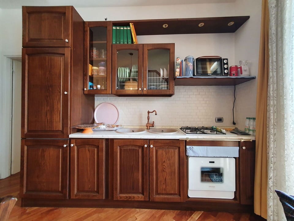 Cabinetry, Major Appliance, Kitchen, Wood, Kitchen Appliance, Countertop, Furniture, Cupboard, Interior Design, Flooring