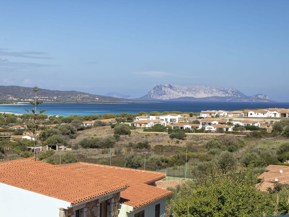 Water, Sky, Cloud, Mountain, Nature, Azure, Building, Highland, Tree, Coastal And Oceanic Landforms
