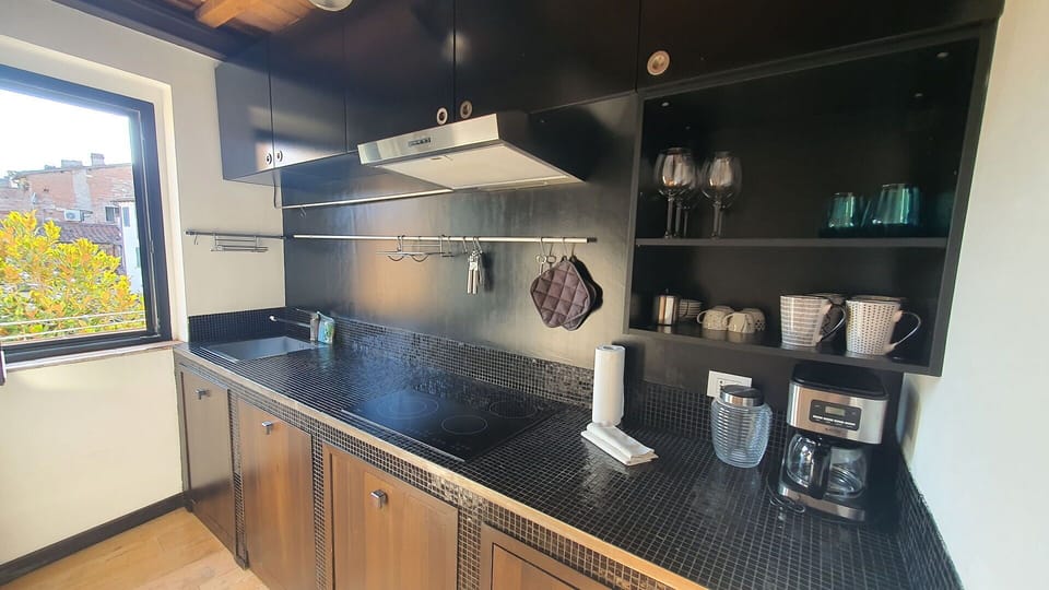 Kitchen, Countertop, Kitchen Appliance, Major Appliance, Cabinetry, Interior Design, Kitchen Stove, Kitchen Sink, Home Appliance