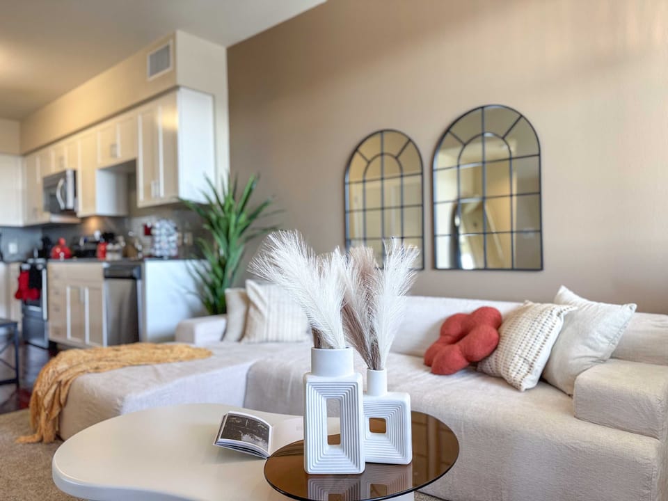 Rustic Vibe Apartment with a stunning Hollywood hills view Living room with a comfy L-shaped sofa and a 55" Smart TV with (Netflix, Hulu, and Disney+ we logged them remotely) included for free