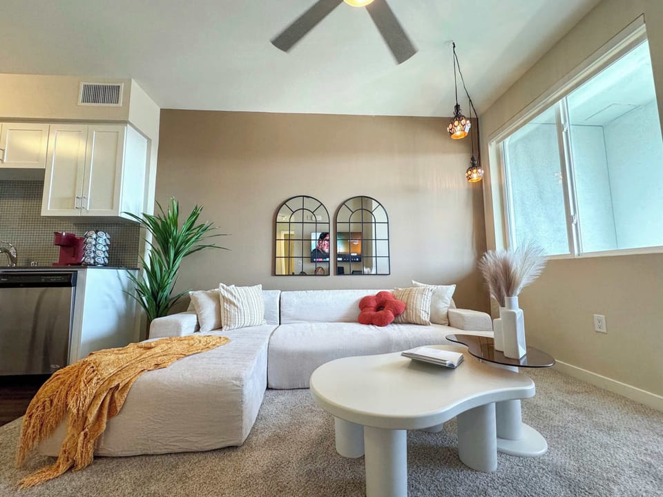 Rustic Vibe Apartment with a stunning Hollywood hills view Living room with a comfy L-shaped sofa and a 55" Smart TV with (Netflix, Hulu, and Disney+ we logged them remotely) included for free