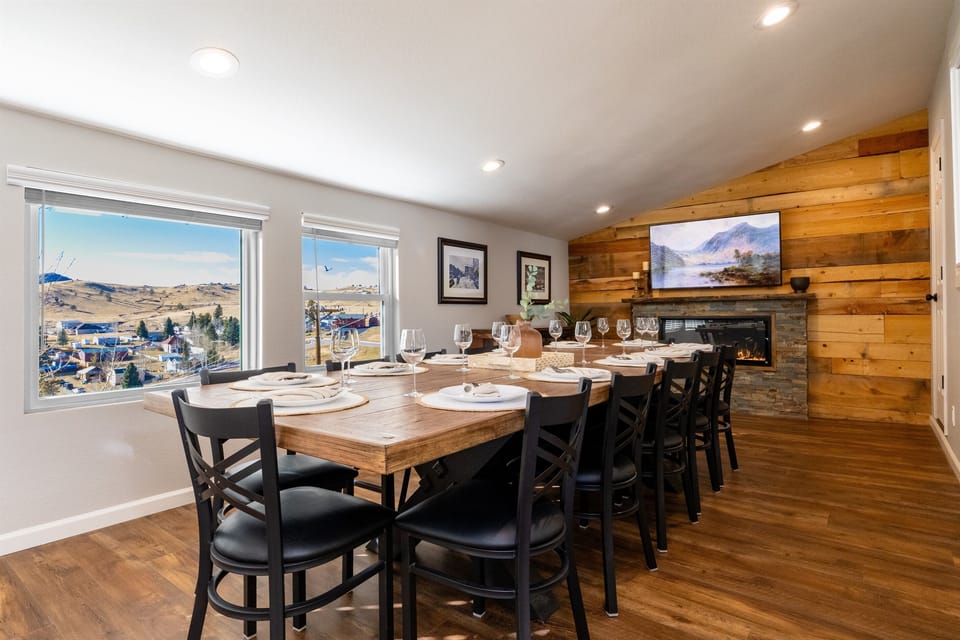 Dedicated dining room seats twelve, with additional seating at the nearby coffee bar and island