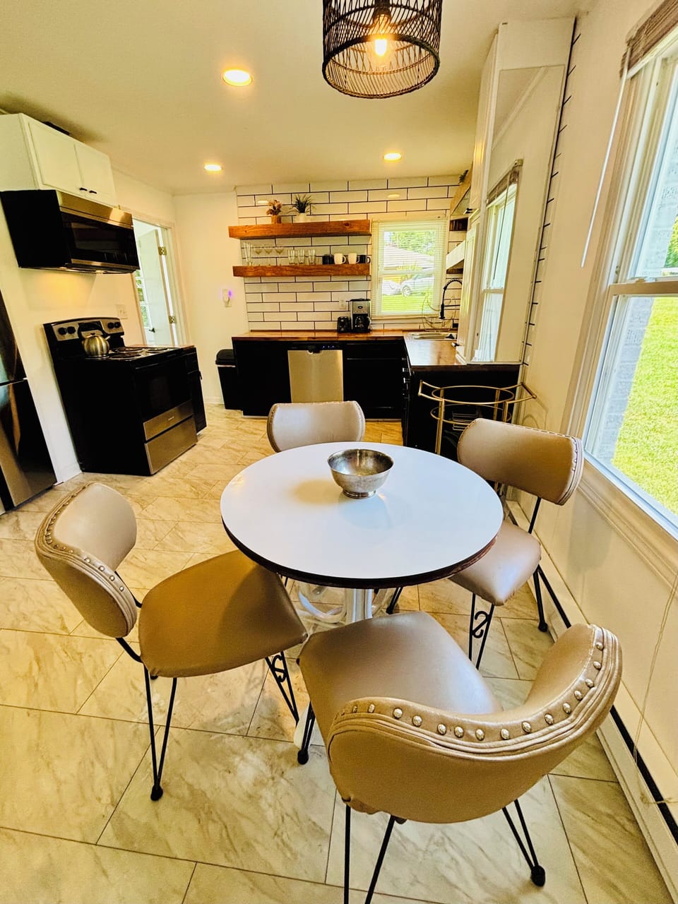 Seating for 4 here in the kitchen with a view of the living room TV