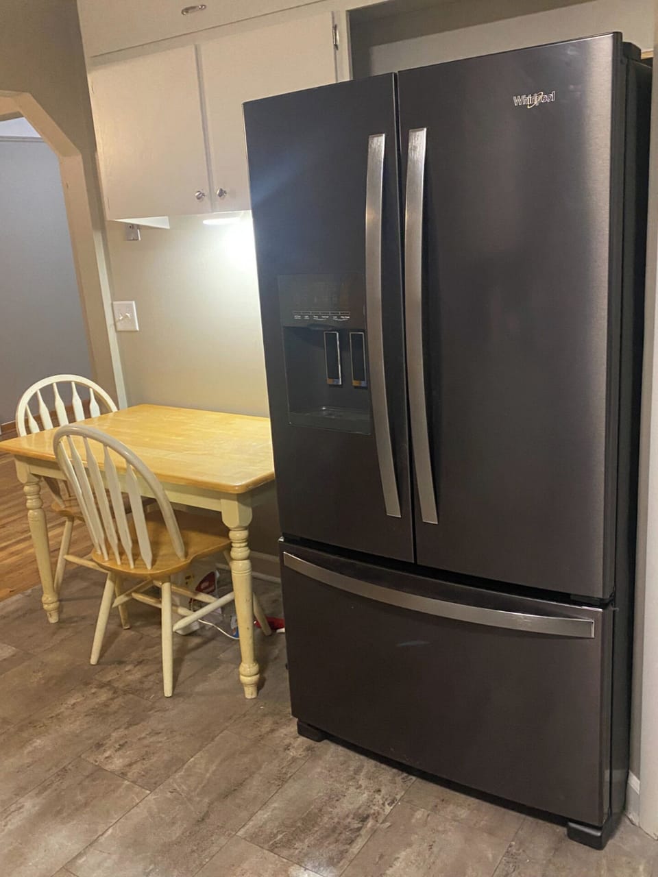 New fridge with plenty of space.ice maker and water dispenser on door
