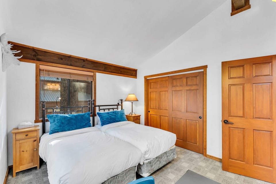 Bedroom 5: 2 twin beds, dedicated workspace, closet, upper floor 
