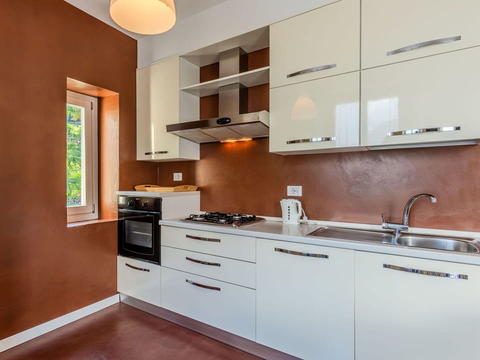 Cabinetry, Countertop, Building, Sink, Property, Furniture, Kitchen Sink, Tap, Kitchen Stove, Wood