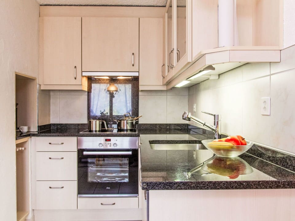 Countertop, Cabinetry, Property, Kitchen Stove, Kitchen, Food, Wood, Sink, Interior Design, Building