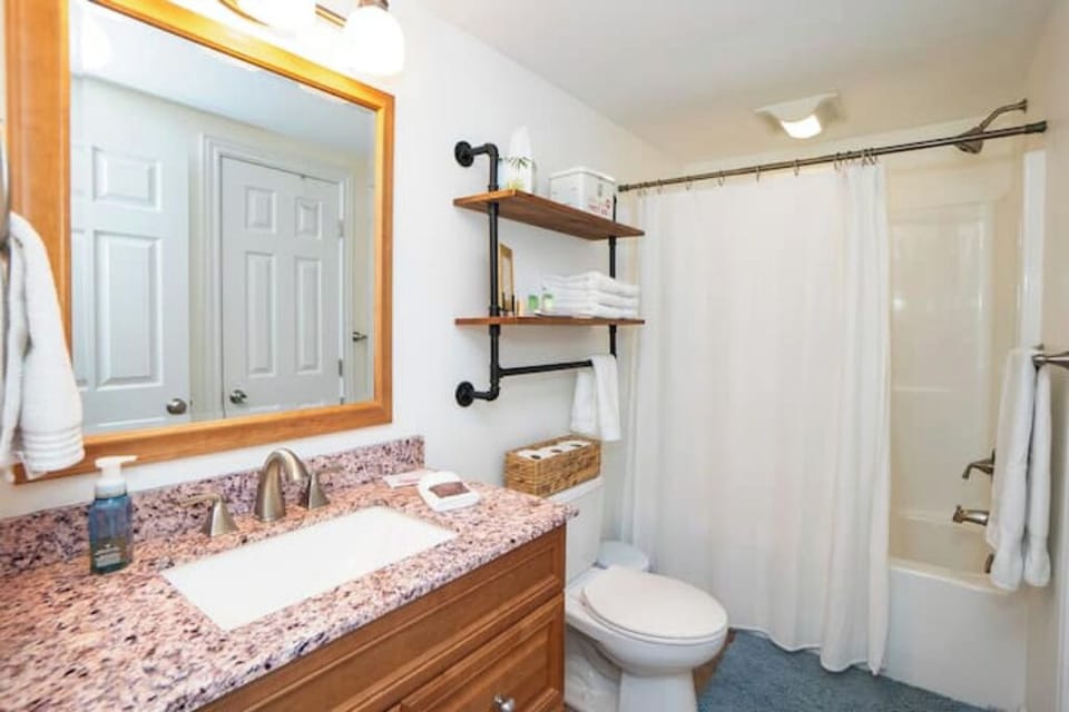 full bathroom with tub and shower