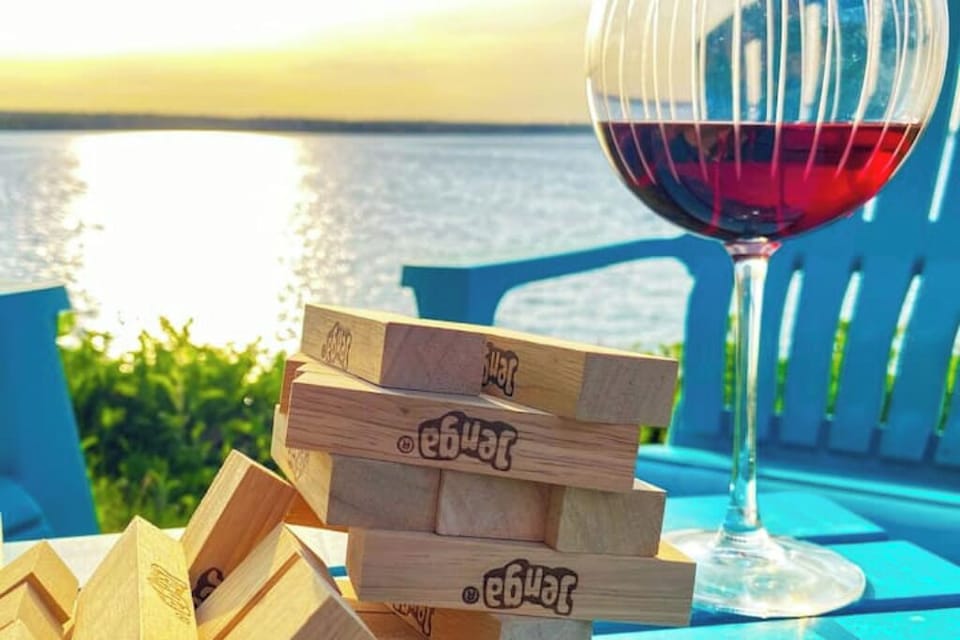 Enjoy a glass of wine by the lake