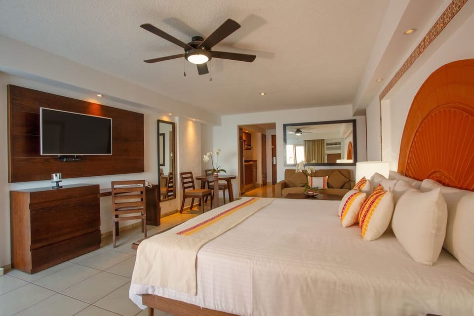Settle into a spacious suite with lounge seating and TV.