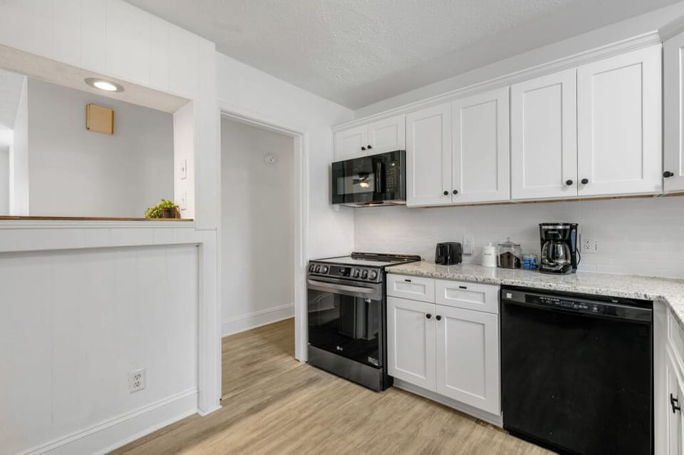 This sleek and modern kitchen is perfect for the minimalist. 