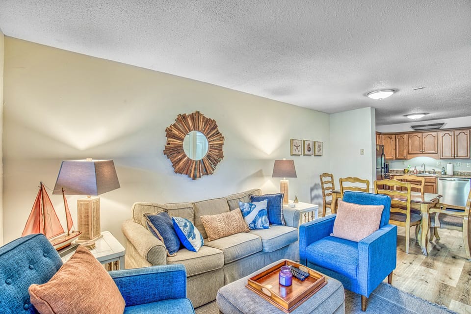 Relax in nautical style with family and friends in this cozy living room and pull-out couch.