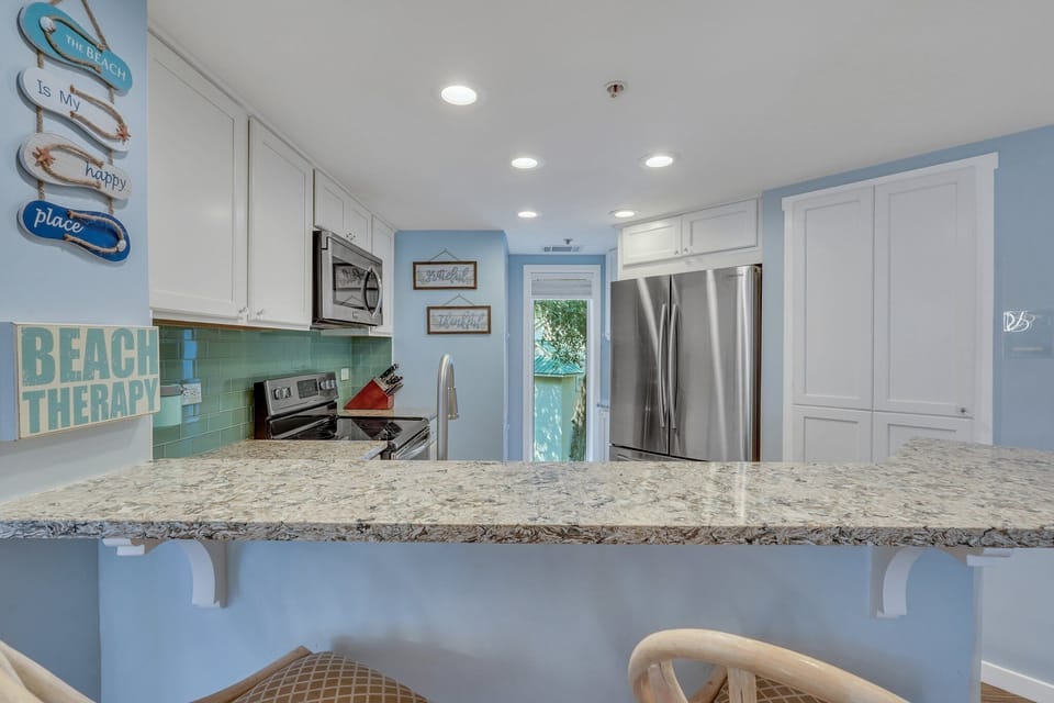 Fully equipped kitchen with stainless steel appliances