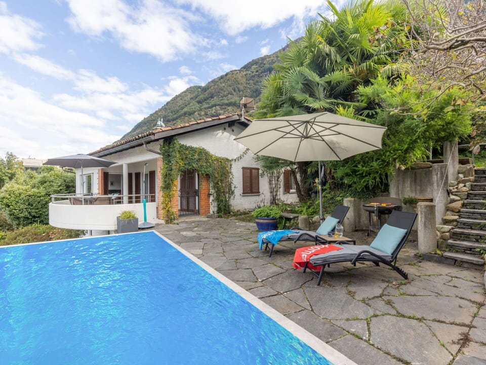 Sky, Building, Plant, Water, Furniture, Cloud, Property, House, Swimming Pool, Outdoor Furniture